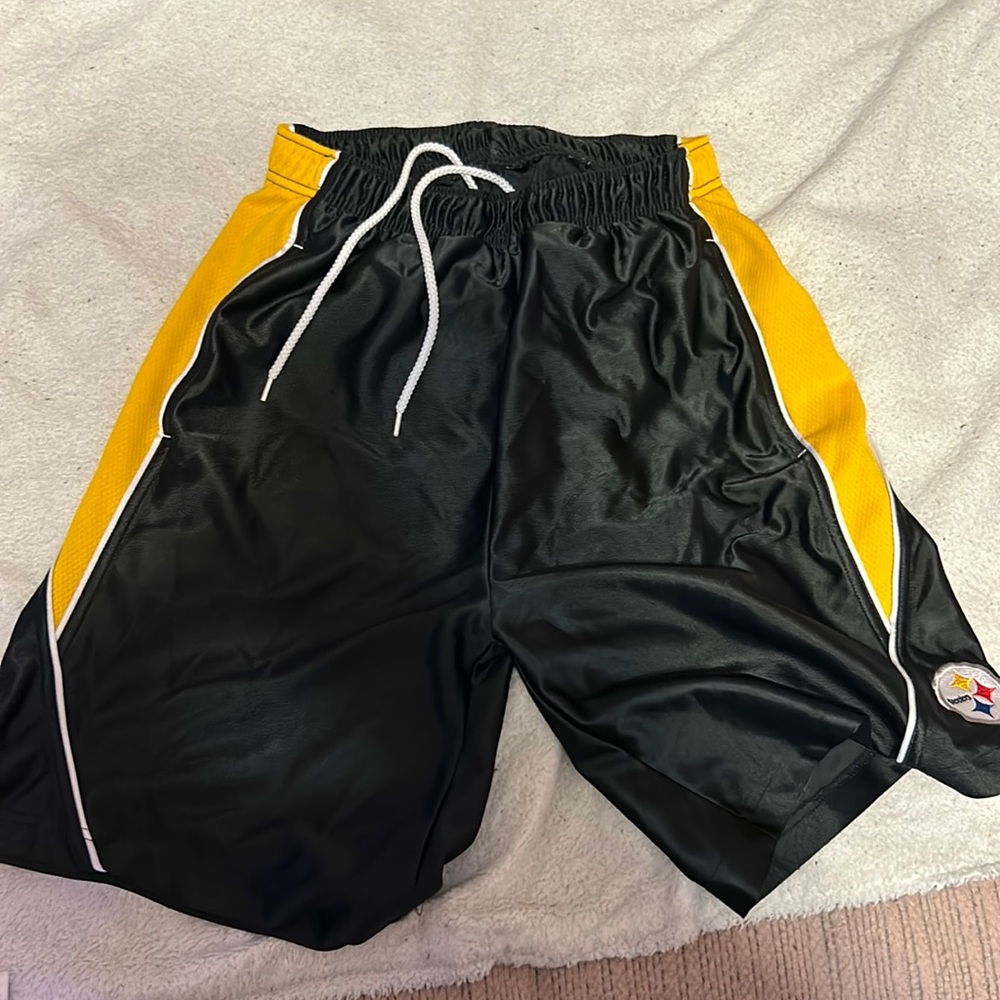 NFL, fits like a large, gold,black,and white